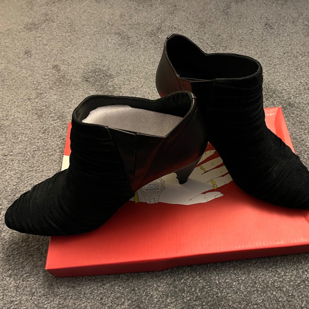 Black suede heeled booties, size 7.